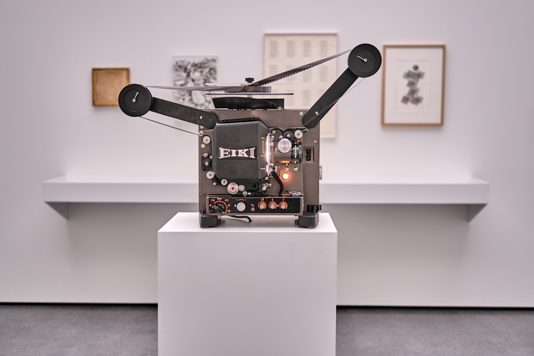 A robotic arm painting on a canvas