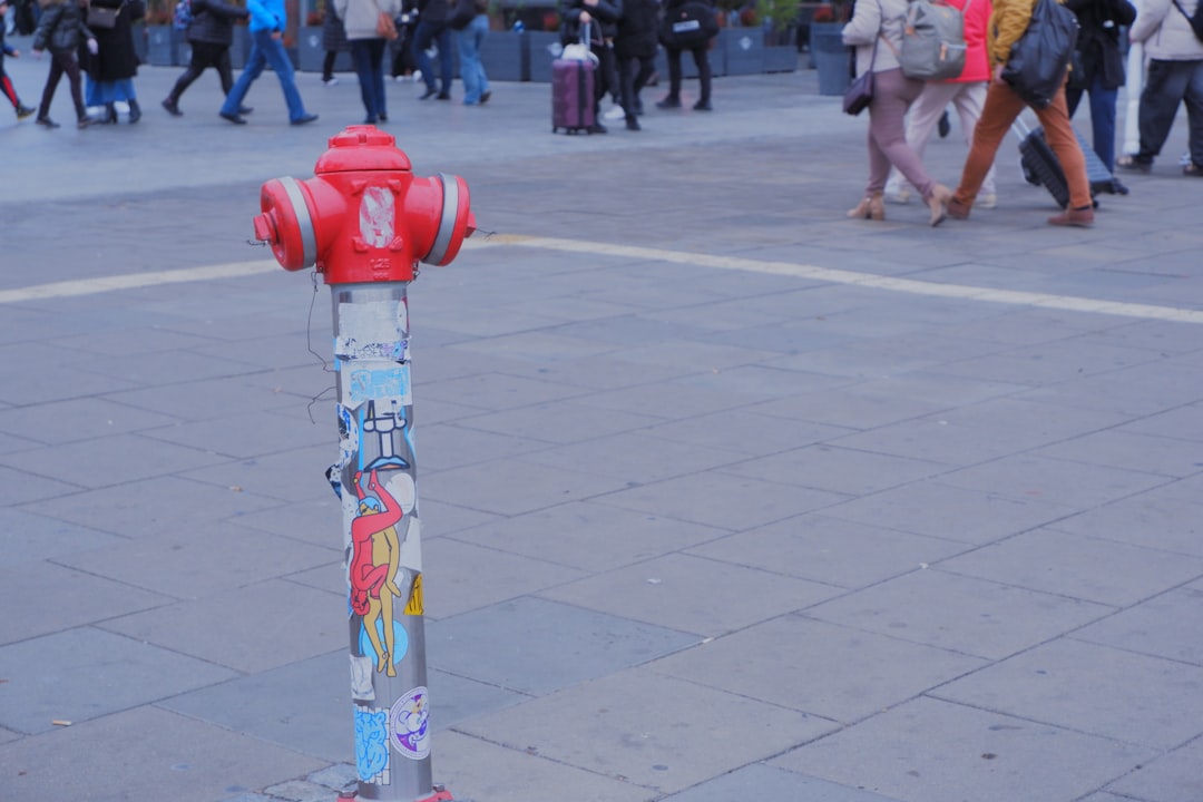 A &ldquo;useless machine&rdquo; with a hand flipping a switch